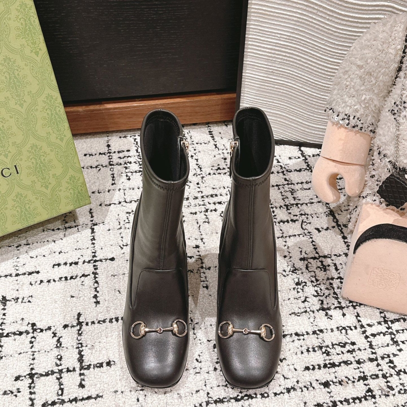 G*u*i boots